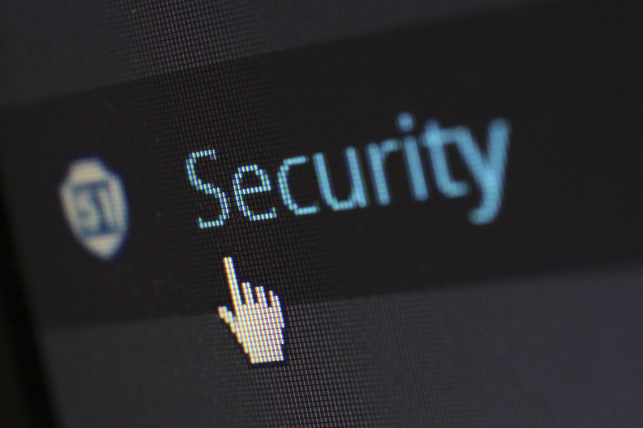 Digital cyber security padlock shield on dark technology background